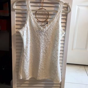 White lace sleeveless top.